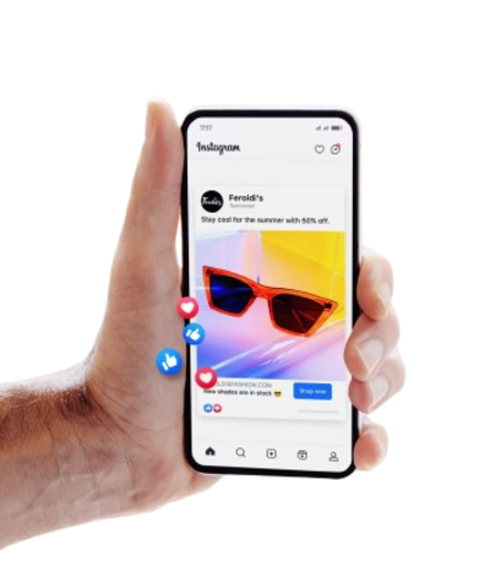 hand holding a phone showing instagram ad